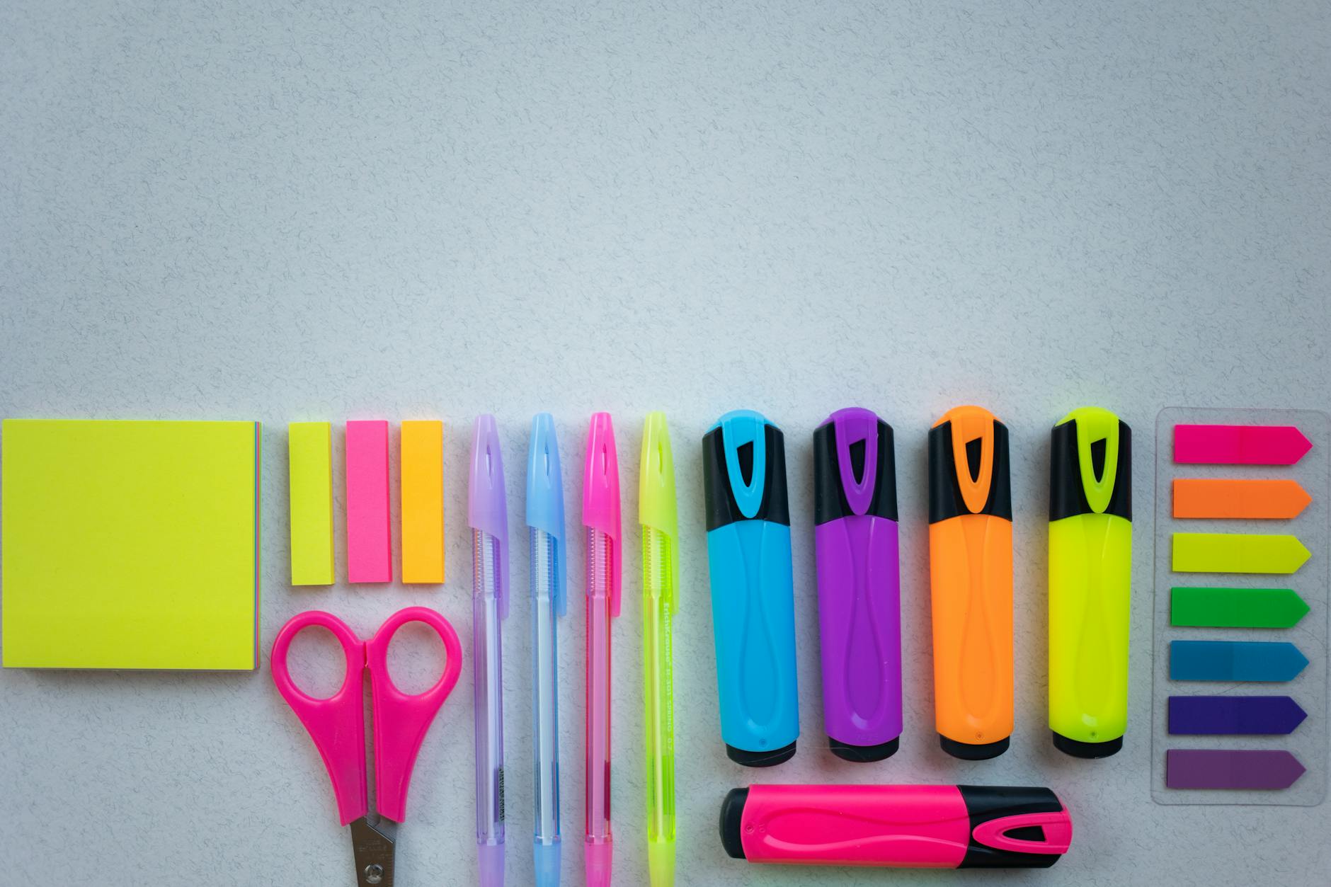 school supplies on white surface